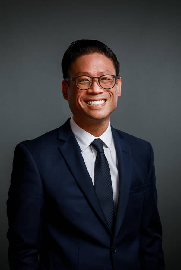 Paul S. Atigapramonj smiling