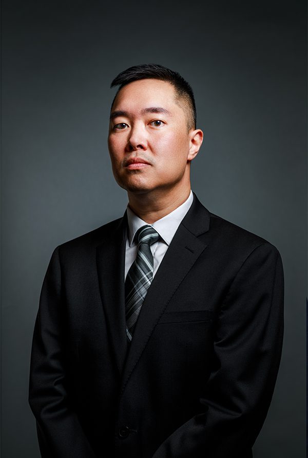 Jimmy ly portrait image in a suit in color