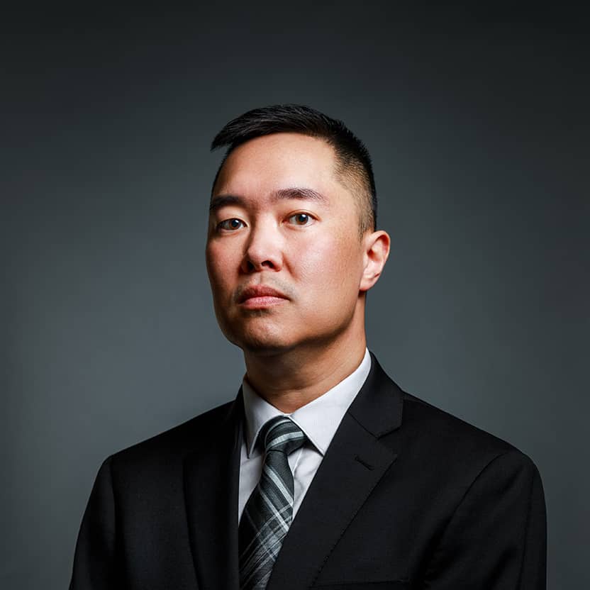 Jimmy Ly portrait image in a suit in color